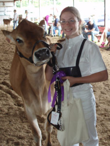 Sadie and her Grand Champion Jersey at Hammond Fair