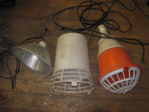 Three Styles of heat lamps least expensive and riskiest (left) to most expensive and safest (right).