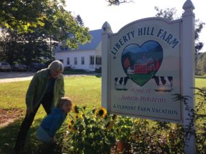 Grandcations are popular at Liberty Hill Farm in Vermont – Farmer Beth Kennett and her granddaughter Ella at Liberty Hill Farm in Vermont, also a popular “grandcation” destination. Photo by Rachel Carter.