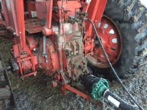 A tractor with no three point hitch which can only be used for towed implements.