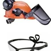 Logging helmet and safety glasses should be worn by anyone operating a saw