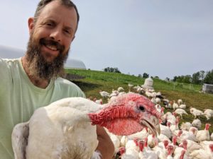 SFQ pasture turkeys farmer selfie