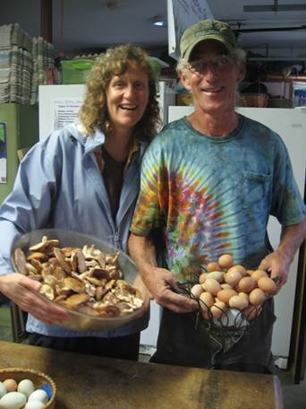 Steven and Julie Rockcastle displaying their products. (Ken Mudge, Cornell University)