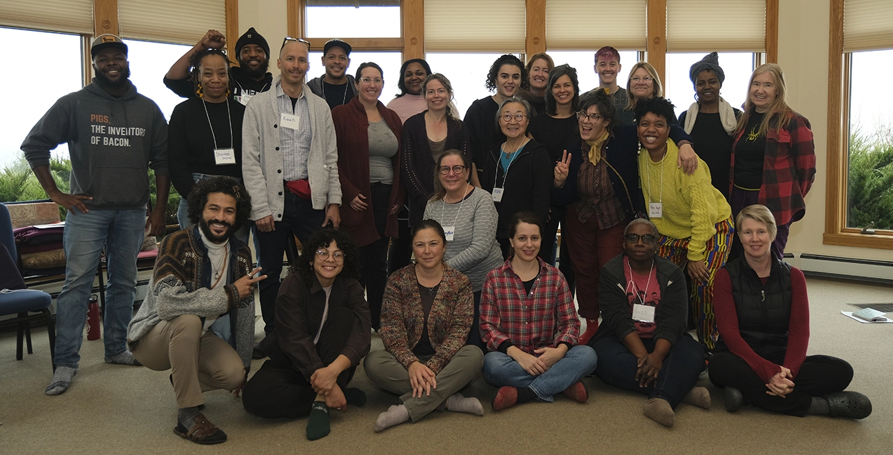 Group photo of participants and facilitators "Coming Home: Centering in Self and Community" retreat